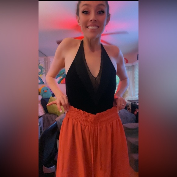 Elegant Black Top with Flowing Coral Pants - Picture 10 of 17